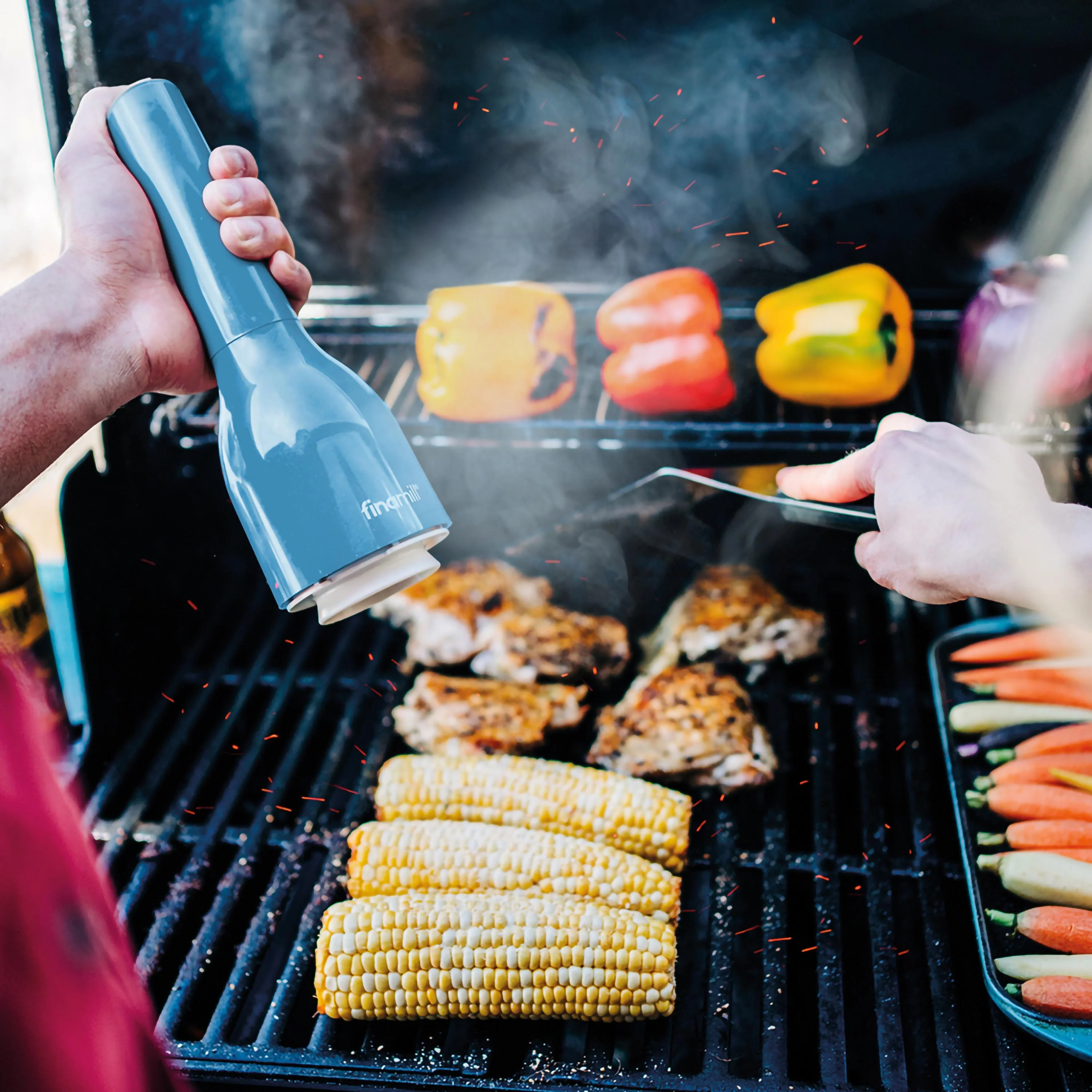 Finamill Navy Blue battery-powered electric spice grinder with 2 containers