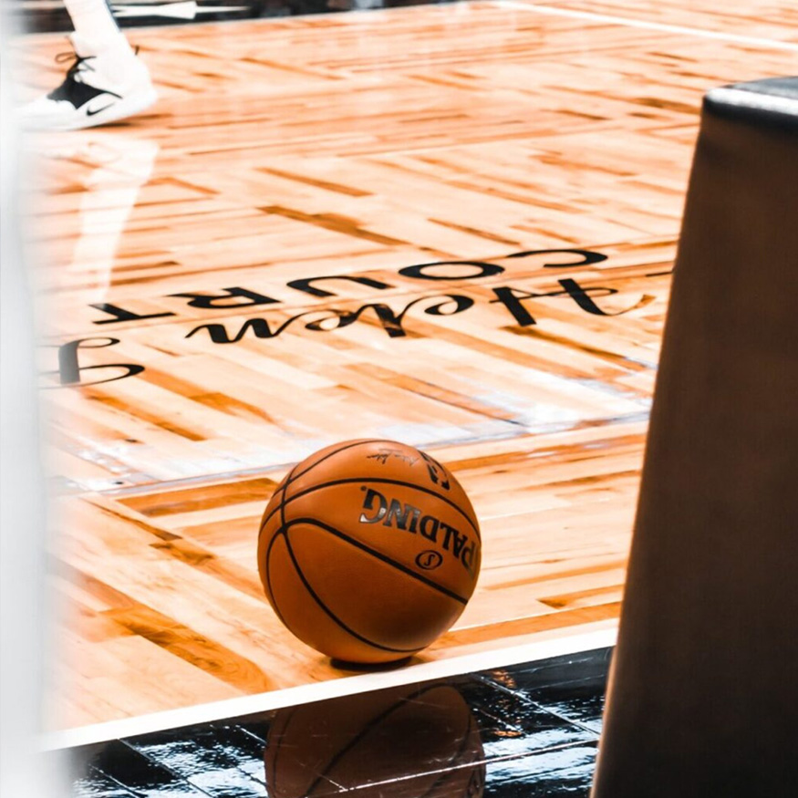 Dusting system for sports flooring